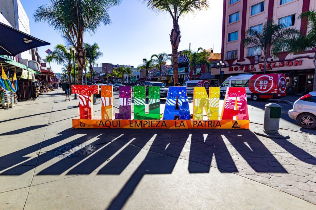 Assorted Colored Plastic Bags On Street During Daytime