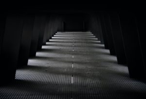 Gray And Black Staircase In A Dark Room